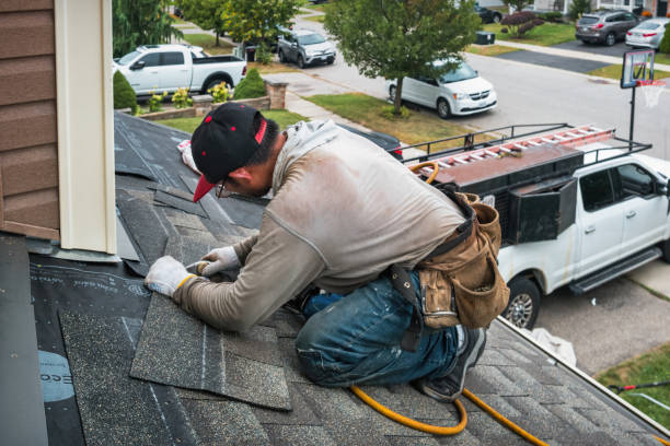 Professional Gutter Repair And Installation technician working in Breckenridge, TX